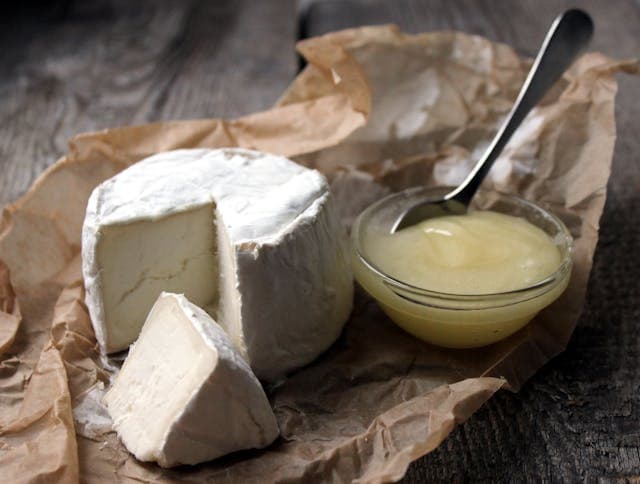 slice if cottage cheese on the chopping board