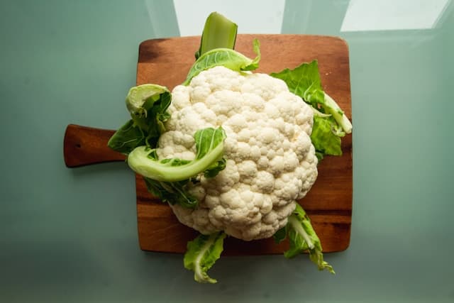 Cauliflower on chopping board